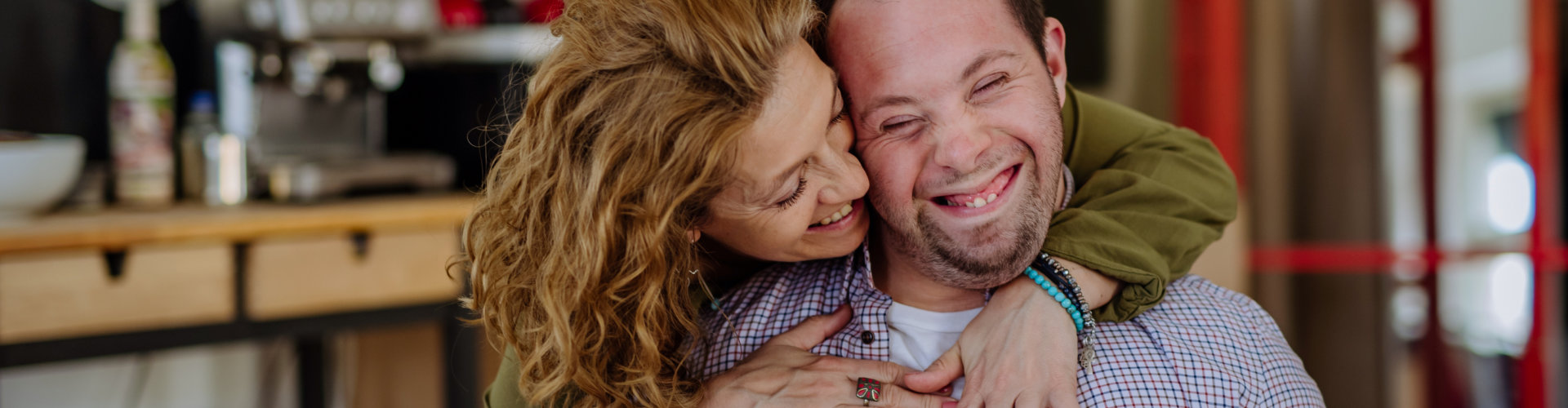 man and woman smiling